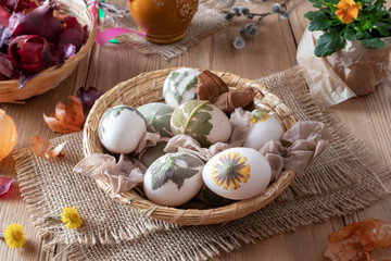 Preparation of Easter eggs for dying with onion peels