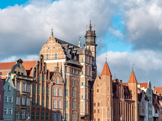 Fototapeta na wymiar Waterfront promenade in Gdansk alongside Motlawa River, old town, very popular tourist location.