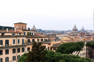 Fototapeta na wymiar Rome, roofs, buildings, pine trees, greenery, rainy, day, spring