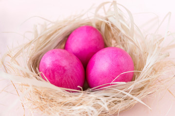 pink, Easter eggs in the nest, chicken boiled Easter eggs