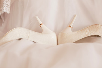 white wedding shoes with rings