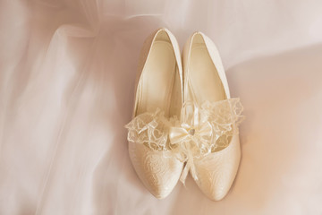 white wedding shoes with rings