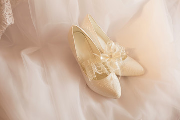white wedding shoes with rings