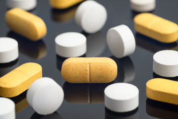 Several tablets on the glass surface.