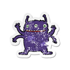 retro distressed sticker of a cartoon alien monster