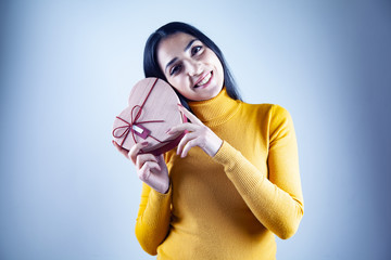 woman hand gift heart in face