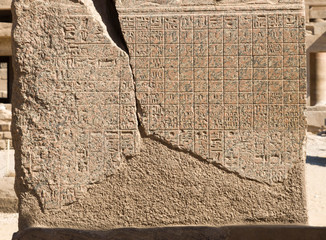 Ancient Egyptian calendar engraved on the stone wall of Temple of Karnak, Luxor, Egypt