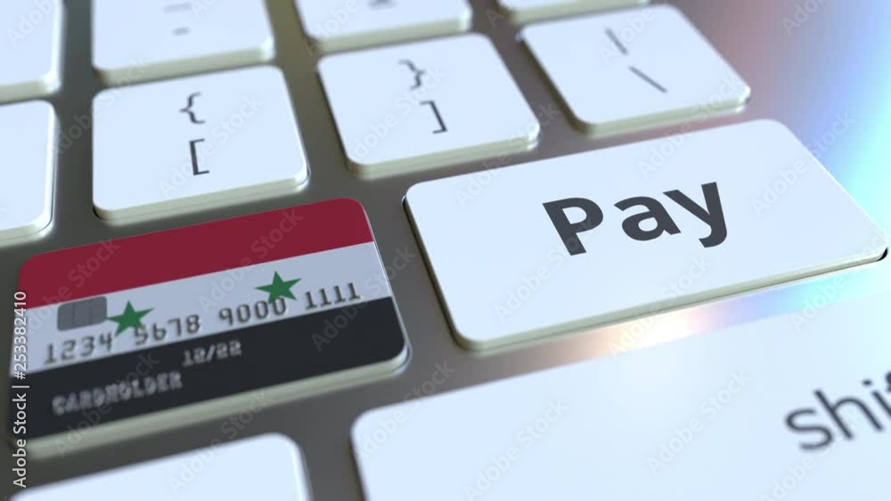 Poster bank card featuring flag of syria as a key on a computer keyboard. syrian online payment conceptual 