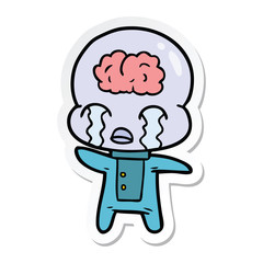 sticker of a cartoon big brain alien crying