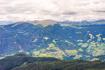Alpe di Siusi, Seiser Alm with Sassolungo Langkofel Dolomite, a view of a large mountain in the background