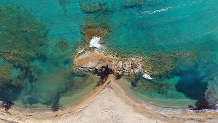 Aerial drone photo of tropical caribbean bay with white sand beach and beautiful turquoise and sapphire clear sea