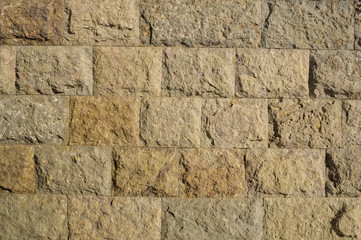 The wall has a raised stone tile.