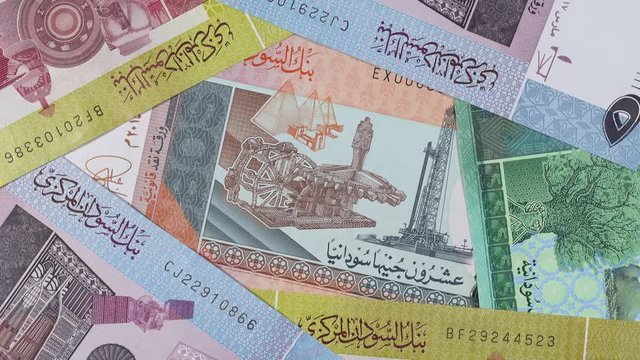 Sudan currency pound notes slow rotating. Sudanese money. 4K stock video footage