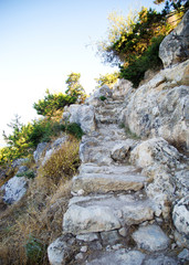 A part of an old stairs made from stones in the mountains