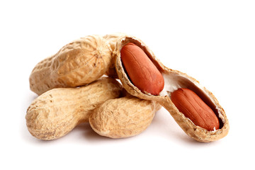 Raw peanuts on white background. Healthy snack ona white background. Top view. close-up.