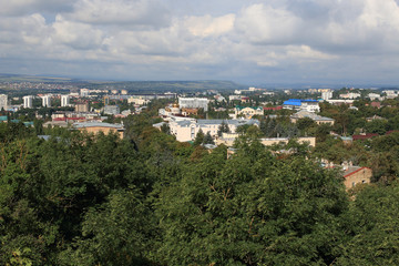 Fototapeta na wymiar Panoramic view of Pyatigorsk town from Mashuk Mountain in a summer day. Stavropol Region, Russia