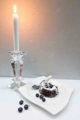 souffle with blueberries . Evening table and sweet concept 