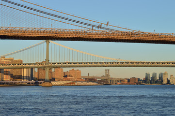 New York City bridges at sunset.