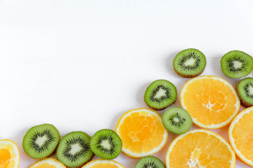 Background for the profile, design, printing with fruit. The basis for the banner with orange and kiwi. Fresh and natkralnye vitamins. Healthy food. Flat lay, top view.