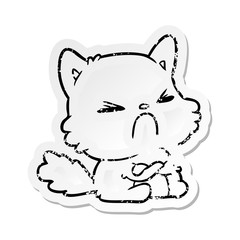 distressed sticker of a cartoon angry cat