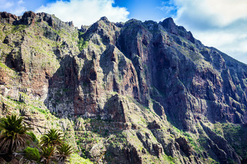 Fototapeta premium Mountain Landscape of the Masca Gorge. Beautiful views of the coast with small villages in Tenerife, Canary Islands