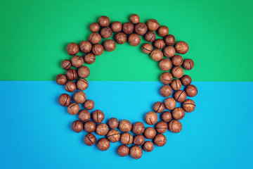 macadamia nuts pattern on blue green background