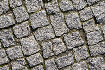 Pflastersteine im Sonnenlicht