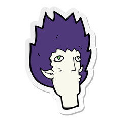 sticker of a cartoon vampire face