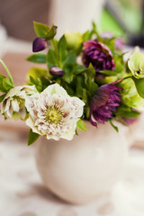 bouquet of white and purple hellebore