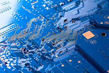 Electronic circuit board close up.