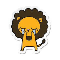 sticker of a crying cartoon lion