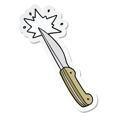 sticker of a cartoon sharp kitchen knife