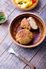 Homemade minced meat on wood.