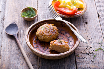 Homemade minced meat on wood.