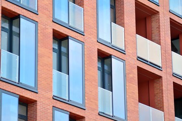Modern condo building with huge windows
