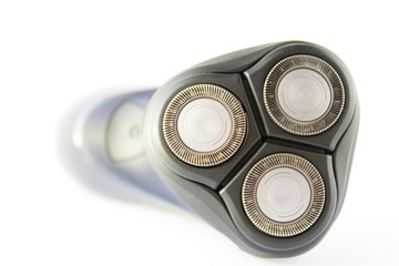Electric shaver for people close-up on a white background.