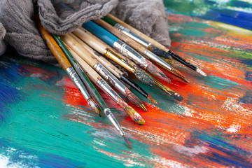 Obraz premium Paint brushes and paints for drawing.