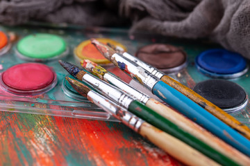 Obraz premium Paint brushes and paints for drawing.