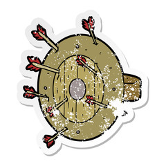 distressed sticker of a shield full of arrows
