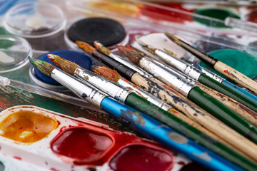 Fototapeta premium Paint brushes and paints for drawing.