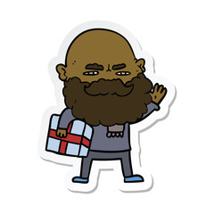 sticker of a cartoon man with beard frowning with xmas gift