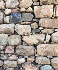 old stone wall of stones