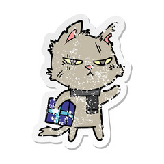 distressed sticker of a tough cartoon cat with christmas present