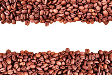 Coffee beans at border of image with copy space for text. Coffee background or texture concept. Coffee beans on white background.