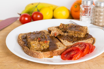 Meatloaf and Gravy on Toast with Sliced Tomatoes