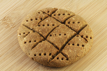 Flatbread made from wheat, rye and buckwheat flour caraway and coriander