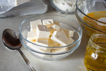 Diced butter in a bowl on the table