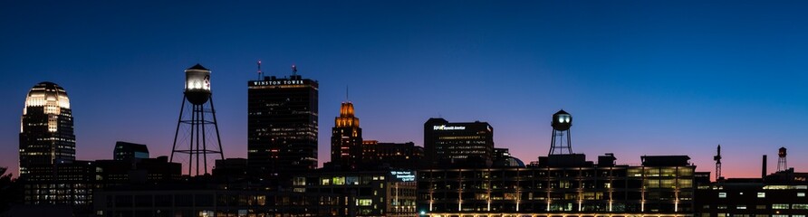 Panorama of the Winston Salem skyline against a beautiful night sky