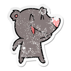 distressed sticker of a laughing bear cartoon