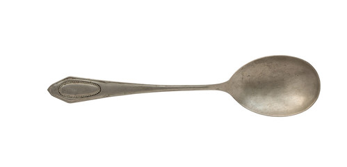Vintage spoon isolated on a white background. Retro silverware